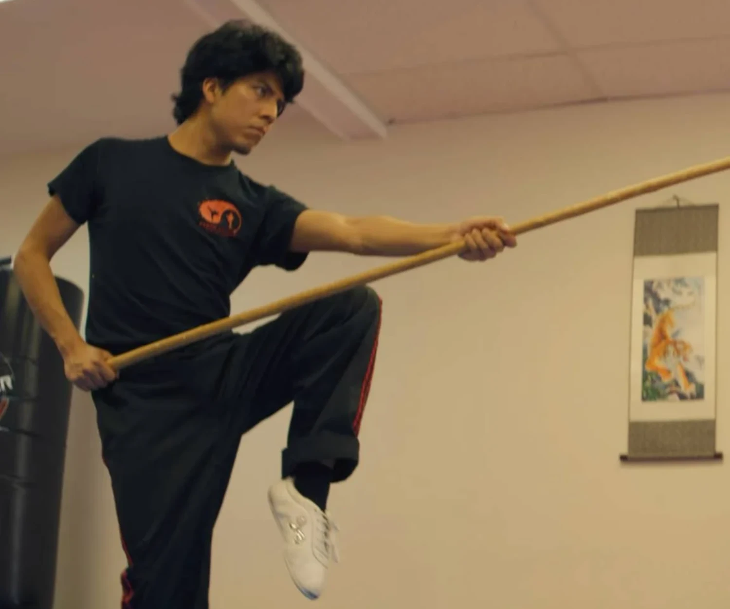 Coach Luis practicing spear forms.