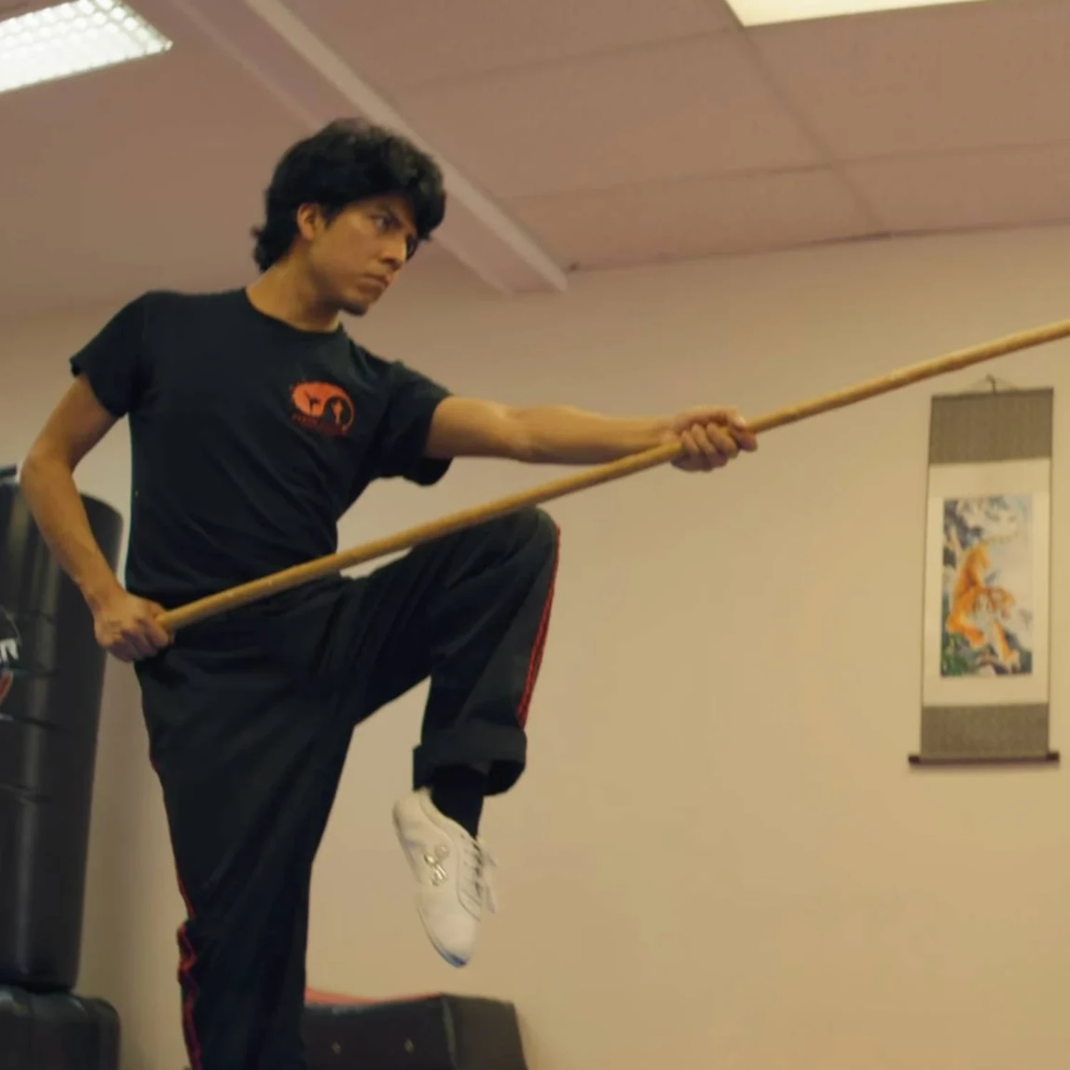 Coach Luis practicing spear forms.